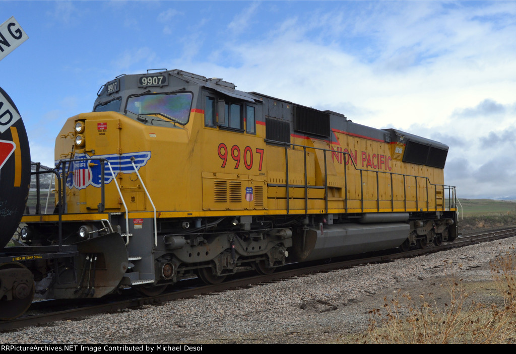 UP SD59MX #9907, running LHF, leads the southbound Cache Valley Local (LCG-41E) just past the W. 4600 N. at Cache Junction, Utah. April 15, 2022